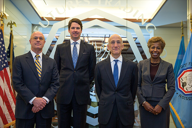 Photo showing the Fiscal Year 2015 Commissioners. From left to right; J. Christopher Giancarlo, Commissioner; Mark P. Wetjen, Commissioner; Timothy G. Massad, Chairman; Sharon Y. Bowen, Commissioner. Photo by Ken Jones Photography.