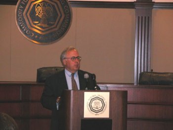 NFA President and CEO Daniel J. Roth at the Podium Addressing Members of the Media, August 26, 2003.